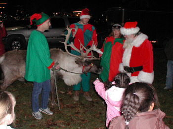 Briarwood Tree Lighting Santa with Donner in crowd.JPG