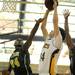 Huron's Nick Perkins, left, reaches to block a shot by Saline's Kevin Moss. Angela J. Cesere | AnnArbor.com