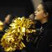 Huron sophomore cheerleader Kaleah Slay cheers next to the court. Angela J. Cesere | AnnArbor.com