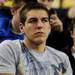 Michigan basketball recruit Mitch McGary watches the game from a seat near the court. Angela J. Cesere | AnnArbor.com