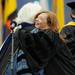 New York Times writer and author Susan Orlean hugs University of Michigan regent Julia Darlow after receiving her honorary Doctor of Humane Letters during the 2012 commencement ceremony. Angela J. Cesere | AnnArbor.com