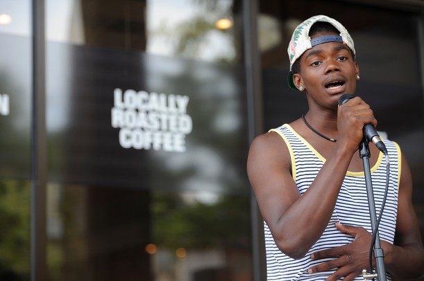 19-year-old David "Delegate" Clair performs during the AnnArbor.com Summer Concert Series on the patio on Friday afternoon. All the bands from this afternoon's performance came from the Neutral Zone, a teen center in Ann Arbor. Angela J. Cesere | AnnArbor.com