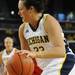 Michigan guard Carmen Reynolds dribbles toward the basket. Angela J. Cesere | AnnArbor.com