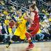 Wolverines Rachel Sheffer drives the ball past Cornhuskers Jordan Hooper during the second half of their game Thursday night.
Courtney Sacco I AnnArbor.com   