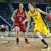 Wolverines Kate Thompson dribbles the ball past Cornhuskers Hailie Sample during the second half of their game Thursday night.
Courtney Sacco I AnnArbor.com   