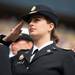 Army ROTC cadet Stephanie Kennedy salutes the flag during the playing of the National Anthem during the University of Michigan's spring commencement at Michigan stadium, Saturday May 4.
Courtney Sacco I AnnArbor.com    