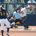 Wolverines freshmen Sierra Lawrence swings at a pitch during the forth inning of their game against California, Saturday May 18.
Courtney Sacco I AnnArbor.com     