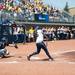 Wolverines sophomore Lauren Sweet hits a home run in the sixth inning of their game against California, Saturday May 18.
Courtney Sacco I AnnArbor.com     