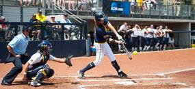 Wolverines pitcher sophomore Sara Driesenga hits the ball during the second inning of the NCAA regional title game against California, Sunday May 19.Courtney Sacco I AnnArbor.com   