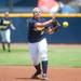 Wolverines senior Ashley Lane throws the ball to first during the second inning of the NCAA regional title game against California, Sunday May 19.
Courtney Sacco I AnnArbor.com 