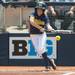 Wolverines senior Amy Knapp tries to bunt the ball during the third inning of the NCAA regional title game against California, Sunday May 19.
Courtney Sacco I AnnArbor.com 