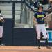 Wolverines senior Amy Knapp looks to the head coach Carol Hutchins during the third inning of the NCAA regional title game against California, Sunday May 19.
Courtney Sacco I AnnArbor.com 