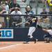 Wolverines freshmen Sierra Romero hits a two run double during the third inning of the NCAA regional title game against California, Sunday May 19.
Courtney Sacco I AnnArbor.com 