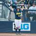 Wolverines junior Caitlin Blanchard stretches before stepping up to bat during the third inning of the NCAA regional title game against California, Sunday May 19.
Courtney Sacco I AnnArbor.com 