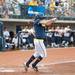 Wolverines junior Lyndsay Doyle hits a single during the seventh inning of the NCAA regional title game against California, Sunday May 19.
Courtney Sacco I AnnArbor.com 