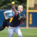 Wolverines third basemen senior Amy Knapp throws the ball to first base for an out during the first inning of the NCAA regional title game against California, Sunday May 19.
Courtney Sacco I AnnArbor.com 