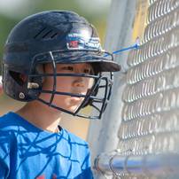 Alex Kim watches the game as he waits for his turn up to bat.
Courtney Sacco I AnnArbor.com 