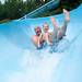 Derail Schroeder and his 3-year-old son Mason ride a tube down a water slide at Rolling Hills Water Park in Ypsilanti Township, Saturday, July 6.
Courtney Sacco I AnnArbor.com    