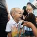 4-year-old Bryant Wilson of Milan laugh as he looks at a kitten during the "adopt-a-thon" held at Petco in Ann Arbor, Saturday, July 20.
Courtney Sacco I AnnArbor.com  