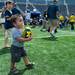 One year old Liam Woolson plays with a football on the field during youth day at Michigan Stadium, Sunday, August, 11.
Courtney Sacco I AnnArbor.com 