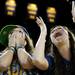 Michigan juniors Colleen Doyle and Whitney Hansen react to a play in the game during a watch party at Crisler Arena on Monday, April 8. Daniel Brenner I AnnArbor.com