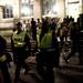 Michigan police officers intervene to extinguish a fire during a celebration on the Diag on Saturday, April 6. Daniel Brenner I AnnArbor.com