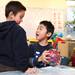 Keitaro Hiwada, right, shows some excitement with Luke Powell while playing with a toy at Lakewood Elementary School December 21, 2011. Certain schools throughout Washtenaw County are starting all-day kindergarten classes. Lakewood has an extended day option. Jeff Sainlar I AnnArbor.com