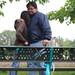 Gemma and Sean Almendras embrace after uncovering the bench dedicated to the memory of their daughter, Mariel, who passed away last November. Angela J. Cesere | AnnArbor.com