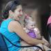 Ann Arbor resident Bekah Wallace holds her 14-month-old daughter, Hannah, as she moves to the music of Dave Boutette and Jason Dennie. Angela J. Cesere | AnnArbor.com 