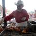 Martin Contreras of Aut Bar grills barbeque chicken for Nashbash. Angela J. Cesere | AnnArbor.com