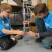 Lawton elementary 5th graders Carsten Wright, left, and Liam Hood build a tower with straws to support weight during the Washtenaw Elementary Science Olympiad. Angela J. Cesere 