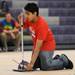 Allen elementary 4th grader Sathya Siddapureddy prepares to launch his rocket with air pressure to hit a target during the Washtenaw Elementary Science Olympiad. Angela J. Cesere