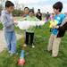 From left: Lawton elementary 5th graders Jayson Song, Michael Sun, Dayna Lim, and Arta Saeednia prepare their water rocket for launch during the Washtenaw Elementary Science Olympiad. Angela J. Cesere 