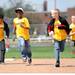  From left: Carpenter elementary 5th graders Devin Walker, A.J. Jackson, Justin Pomo, and Lochlann Dunlavey run back after setting up their water rocket for launch during the Washtenaw Elementary Science Olympiad. Angela J. Cesere  