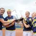 From left: Michigan seniors Hilary Payne, Amanda Chidester, Bree Evans, and Stephanie Kirkpatrick hold up the Big Ten conference champions trophy at the end of the Michigan vs. Purdue softball game at Wilpon Softball Complex in Ann Arbor, Mich. on Saturday afternoon. Michigan won all three games against Purdue. Angela J. Cesere | AnnArbor.com