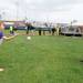 Clio resident John Cherry plays catch with his 5-year-old granddaughter, Madeline Cherry, in-between double header Michigan softball games against Purdue on Saturday afternoon. Angela J. Cesere | AnnArbor.com