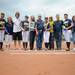 From left to right: The Michigan softball team seniors, Amanda Chidester, Bree Evans, Stephanie Kirkpatrick, and Hilary Payne stand with their families while posing for photos before the third series game against Purdue on Saturday. Angela J. Cesere | AnnArbor.com