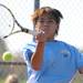 Skyline's Kazuki Mutsuro hits the ball during a 1st doubles match against Canton at the tennis regionals at Pioneer High School on Oct. 7, 2011. Angela J. Cesere | AnnArbor.com