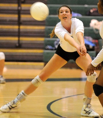 Images from the Huron volleyball team's victory over Skyline