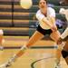 Skyline's Maggie Halloran reaches to bump the ball during the volleyball game against Huron at Ann Arbor Huron High School on Oct. 4, 2011. Angela J. Cesere | AnnArbor.com