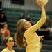 Huron's Sarah Edwards jumps up to spike the ball during the volleyball game against Skyline at Ann Arbor Huron High School on Oct. 4, 2011. Angela J. Cesere | AnnArbor.com