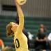 Huron's Kristen Vyletel jumps up to spike the ball during the volleyball game against Skyline at Ann Arbor Huron High School on Oct. 4, 2011. Angela J. Cesere | AnnArbor.com