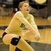 Huron's Kristen Vyletel reaches to bump the ball during the volleyball game against Skyline at Ann Arbor Huron High School on Oct. 4, 2011. Angela J. Cesere | AnnArbor.com