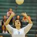 Skyline's Caroline Gallagher sets the ball during the volleyball game against Huron at Ann Arbor Huron High School on Oct. 4, 2011. Angela J. Cesere | AnnArbor.com