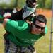 Ypsilanti resident Bryan Adato gives his dog, Olive, a piggy back ride after she jumped on his back during the Walk and Wag fundraiser for the Humane Society of Huron Valley at Rolling Hills Park on Saturday morning. Angela J. Cesere | AnnArbor.com