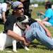 Ypsilanti resident Patrick Harrison sits with his dog, Tina, during the Walk and Wag fundraiser for the Humane Society of Huron Valley at Rolling Hills Park on Saturday morning. Angela J. Cesere | AnnArbor.com