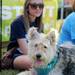 16-year-old Livonia resident Haley Bogrin sits with her dog, Cleo, during the Walk and Wag fundraiser for the Humane Society of Huron Valley at Rolling Hills Park on Saturday morning. Angela J. Cesere | AnnArbor.com