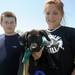 Ypsilanti residents Shelby Wilson, right, and her cousin Dominic Ciaramitaro, stand with Dominic's puppy, Oden, during the Walk and Wag fundraiser for the Humane Society of Huron Valley at Rolling Hills Park on Saturday morning. Angela J. Cesere | AnnArbor.com