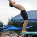 9-year-old Georgetown Country Club dive team member John Schenk leans back into a dive. Angela J. Cesere | AnnArbor.com 