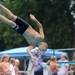 10-year-old Racquet Club dive team member Ethan Walsh twists during his dive. Angela J. Cesere | AnnArbor.com 